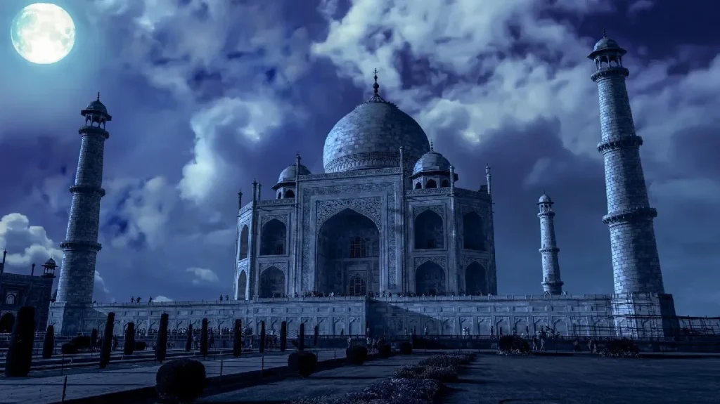 Taj Mahal Tour Guide showing the monument illuminated during night viewing